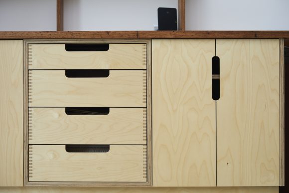 Fingerpulls in plywood cabinetry